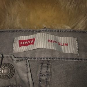 Levi’s ripped gray wash jeans